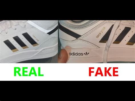 how to spot fake adidas track pants|adidas tracksuit counterfeit.